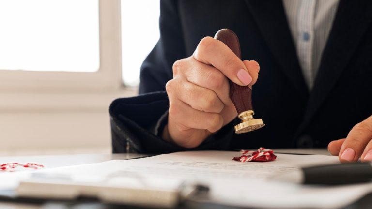 person using wax seal certificate 23 2148769676
